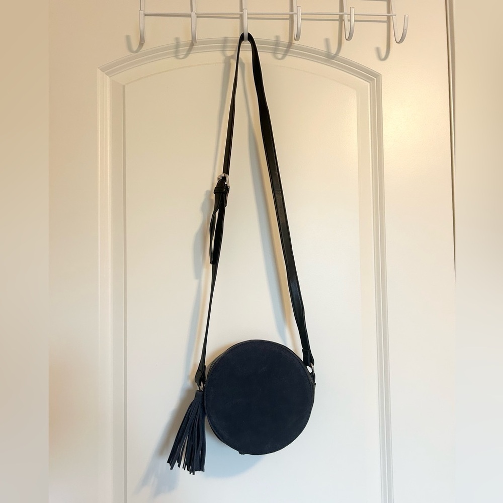 Black faux leather/suede Circle Crossbody Bag with tassel
